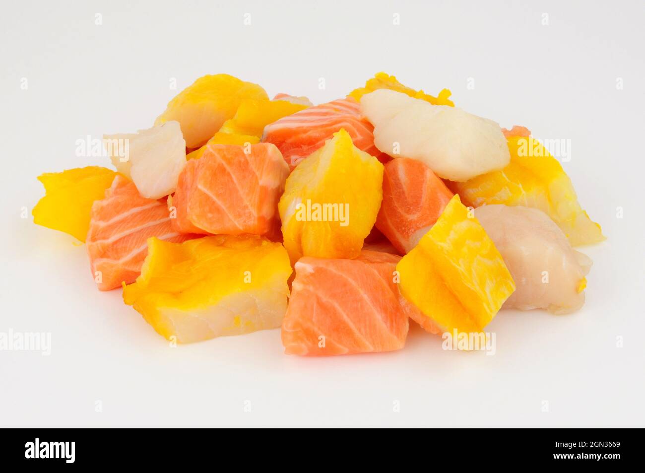 Mixed group of fresh raw salmon, cod and smoked haddock chunks prepared