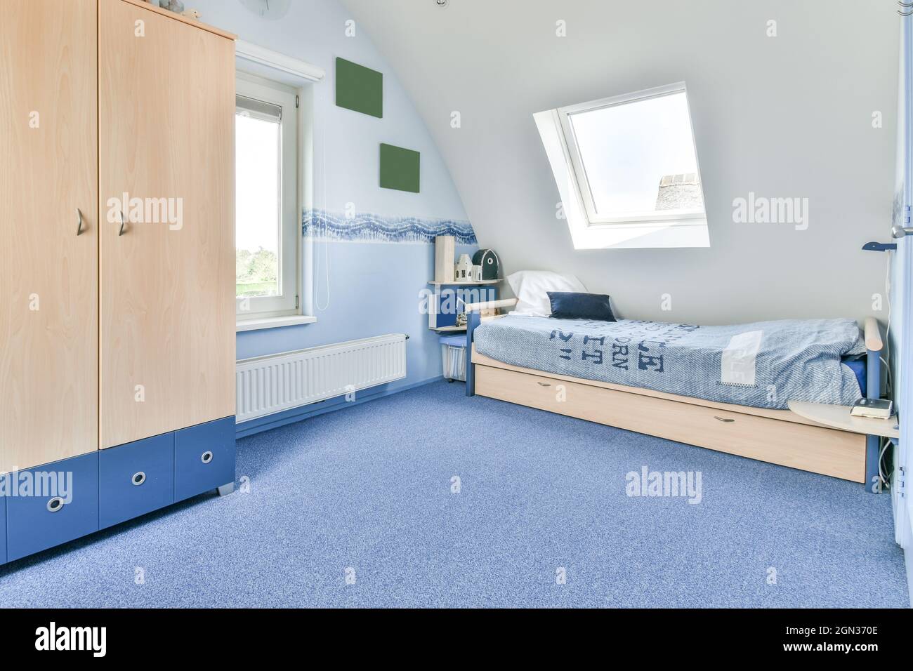 Creative design of bedroom with closet against bed and radiator under