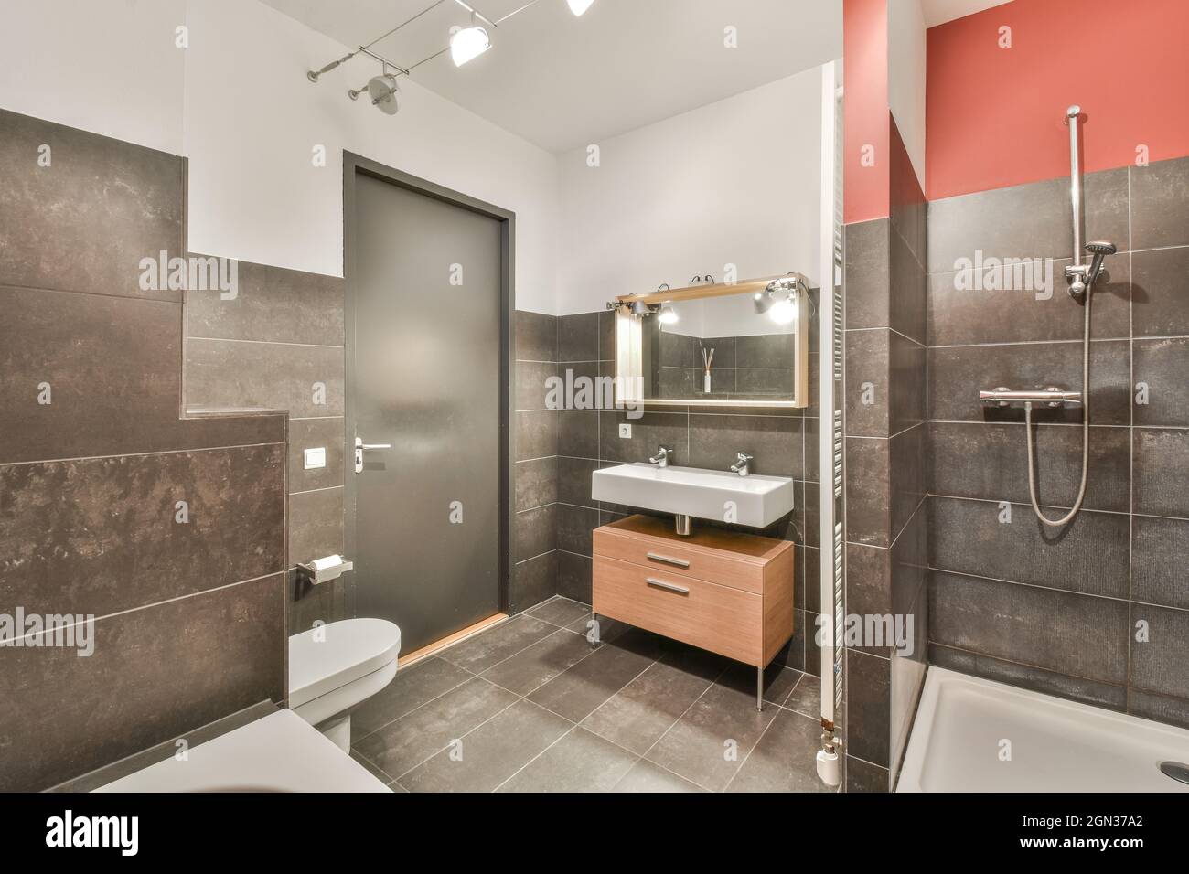Combined bathroom with bathtub shower cabin and sink with double
