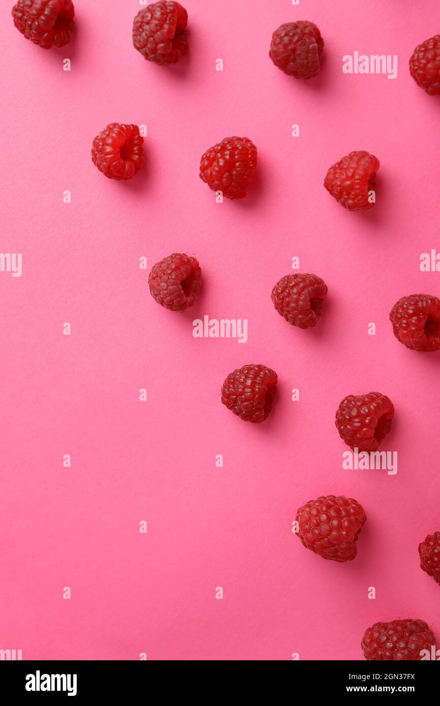 Raspberry Flat Lay Flat lay composition with red juicy raspberries on a pink background ...
