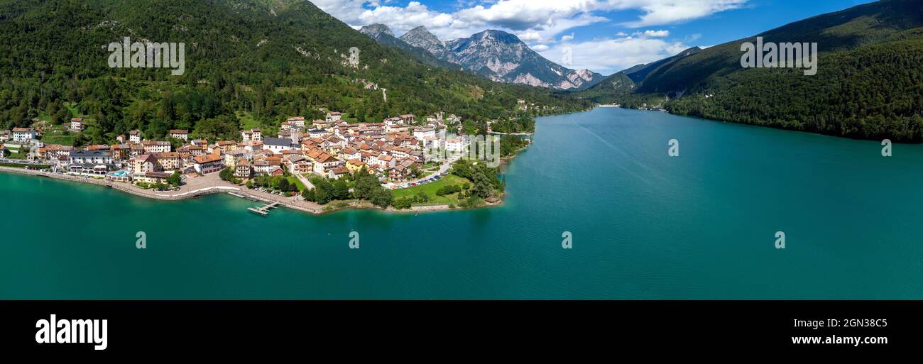 Panoramic shot of the serene Lago di Barcis lake with turquoise water in Italy Stock Photo