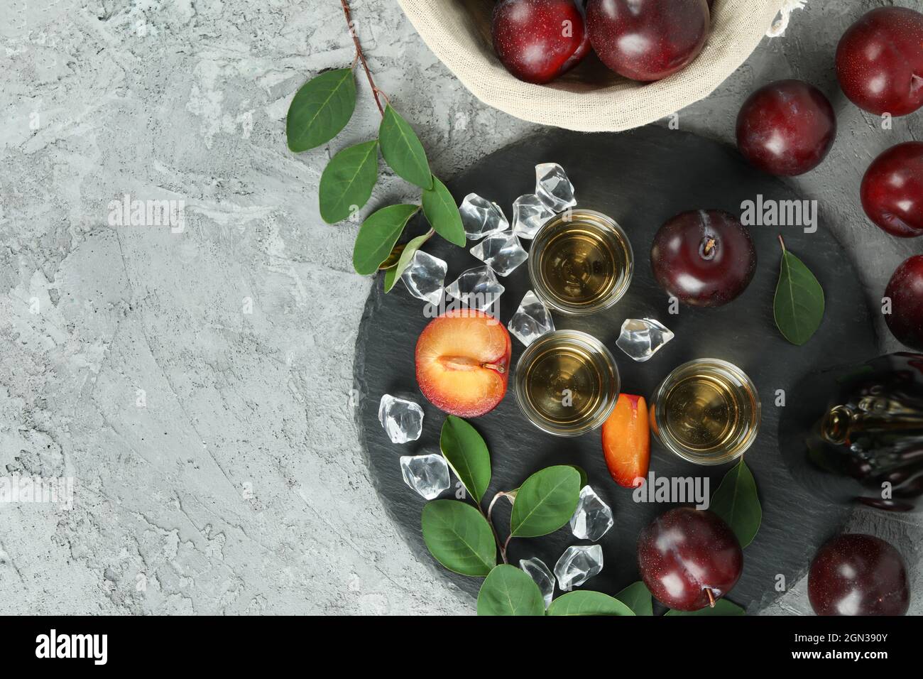 Concept of alcohol with plum vodka, top view Stock Photo Alamy