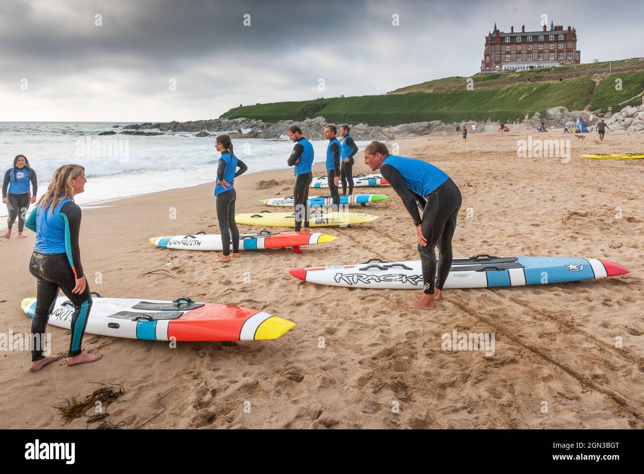 Members of Newquay Surf Lifesaving Club at a training session on Fistral Beach in Newquay in Cornwall. Stock Photo