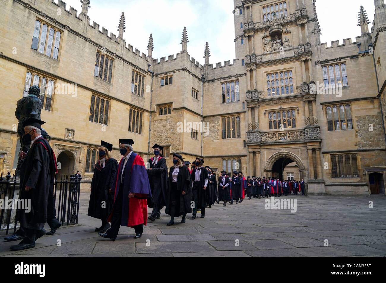 A procession through the Bodleian Library quadrangle at Oxford ...