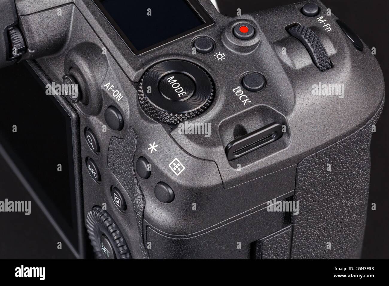 modern professional black digital photo camera controls - buttons, wheels, screens and joystick - close-up view Stock Photo