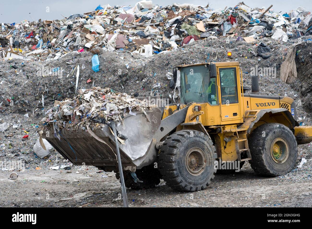 Volvo wheeled loader working at a materials recycling facility in the UK. Stock Photo