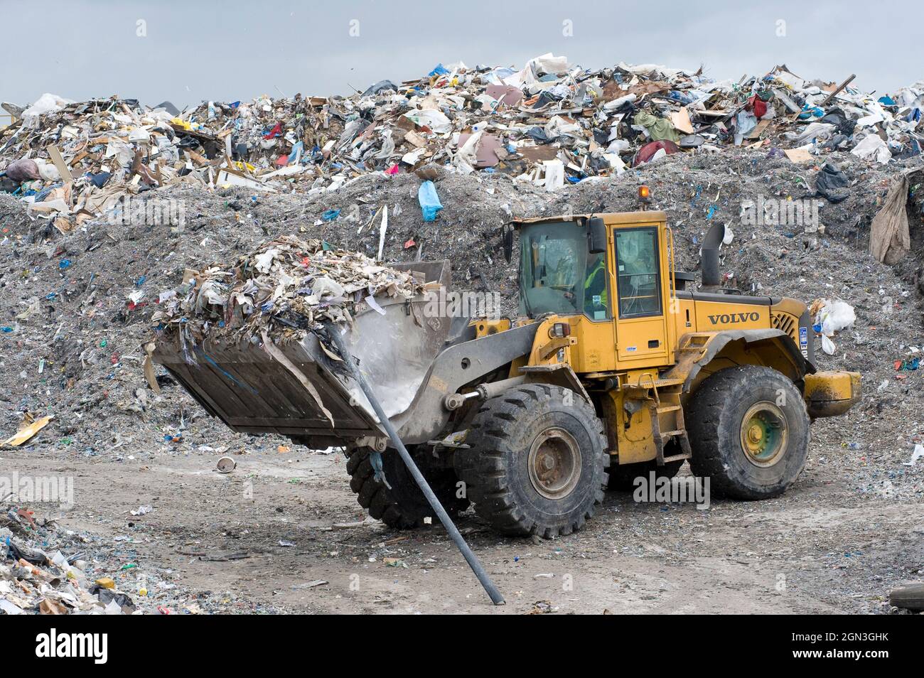 Volvo wheeled loader working at a materials recycling facility in the UK. Stock Photo