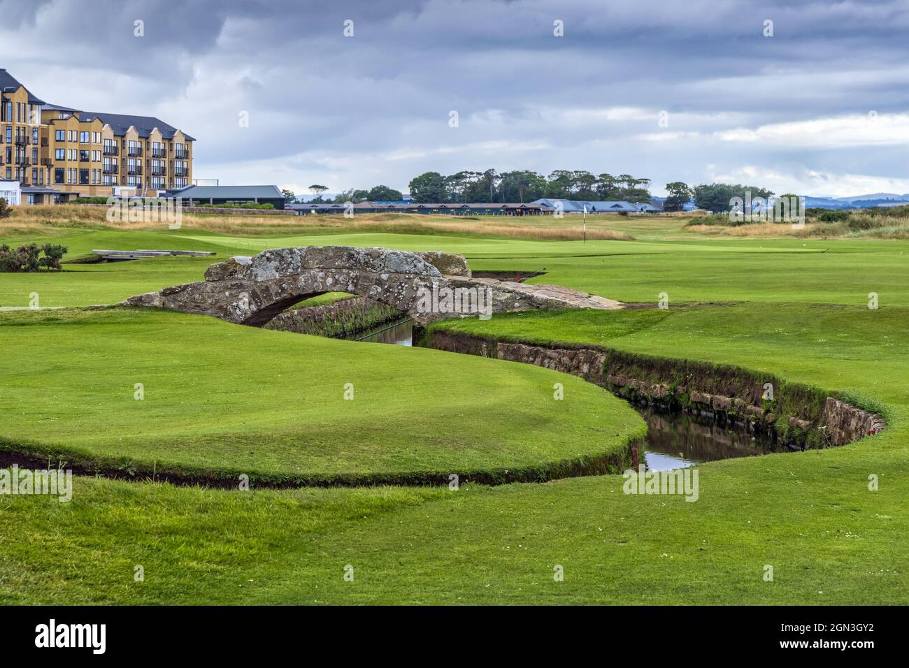 The famous Swilken (or Swilcan) Bridge over Swilken Burn between the first and eighteenth fairways of the Old Course at St Andrews in Fife, Scotland. Stock Photo