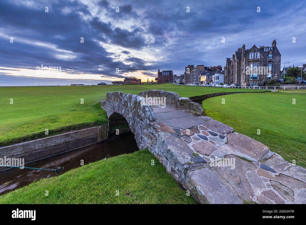 The famous Swilken (or Swilcan) Bridge over Swilken Burn between the first and eighteenth fairways of the Old Course at St Andrews in Fife, Scotland. Stock Photo