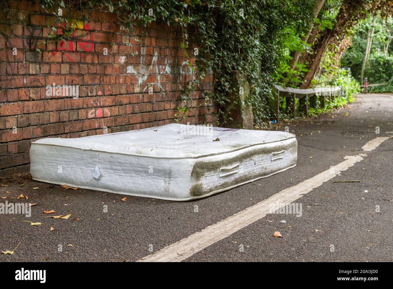 Illegally dumped mattress Stock Photo Alamy