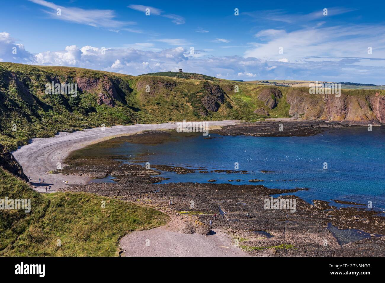 View over Castle Haven Bay, with the War Memorial standing on Black Hill in the distance, just south of Stonehaven in Aberdeenshire, Scotland. Stock Photo