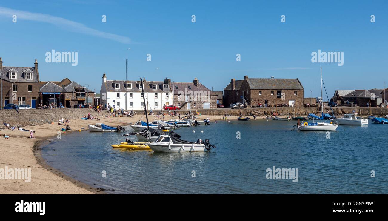 The popular sandy beach in the picturesque Stonehaven harbour, Aberdeenshire, Scotland. Stock Photo