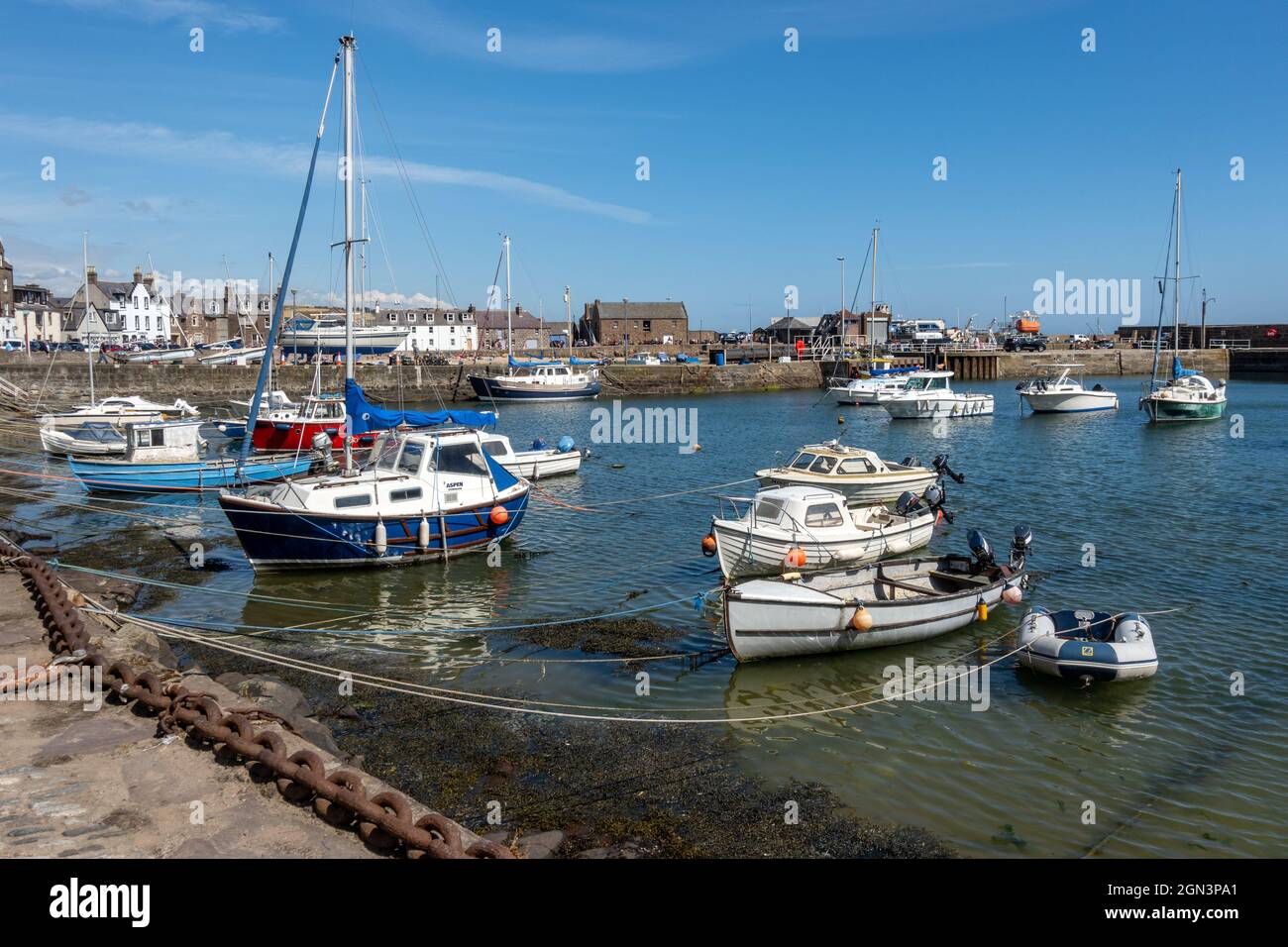 Boats moored in the picturesque harbour at Stonehaven in Aberdeenshire, Scotland. Stock Photo