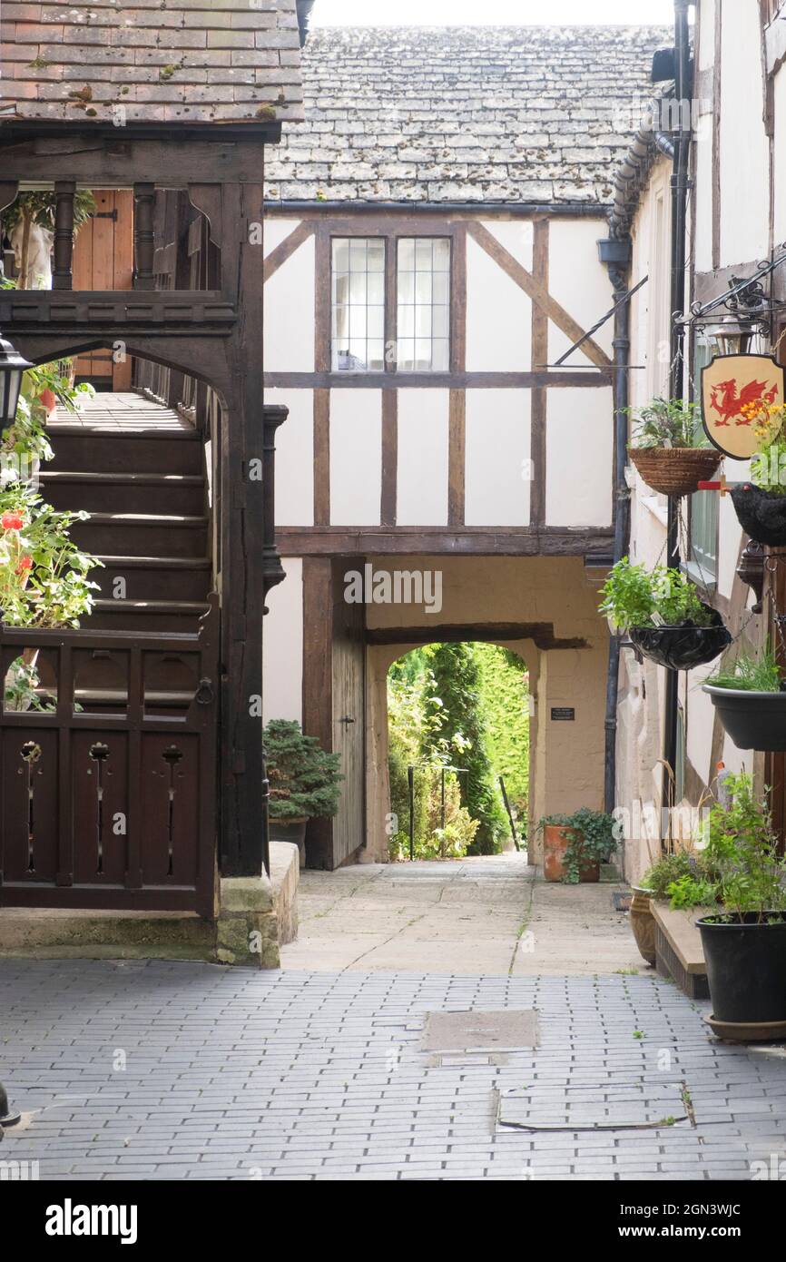 Views of a small Cotswold market town in Gloucestershire, UK The Lion courtyard