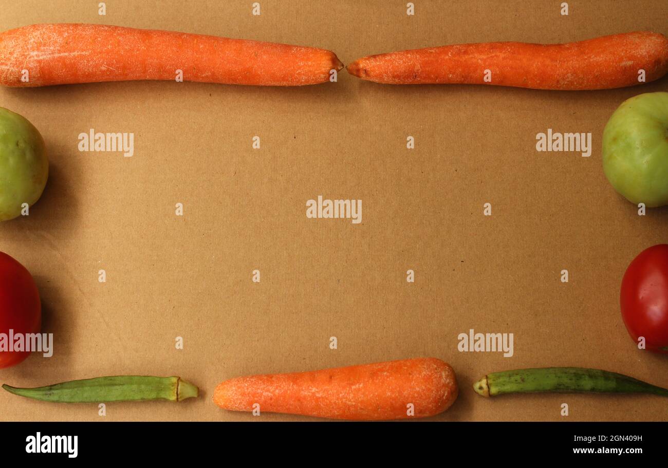Frame created with colorful raw vegetables Stock Photo