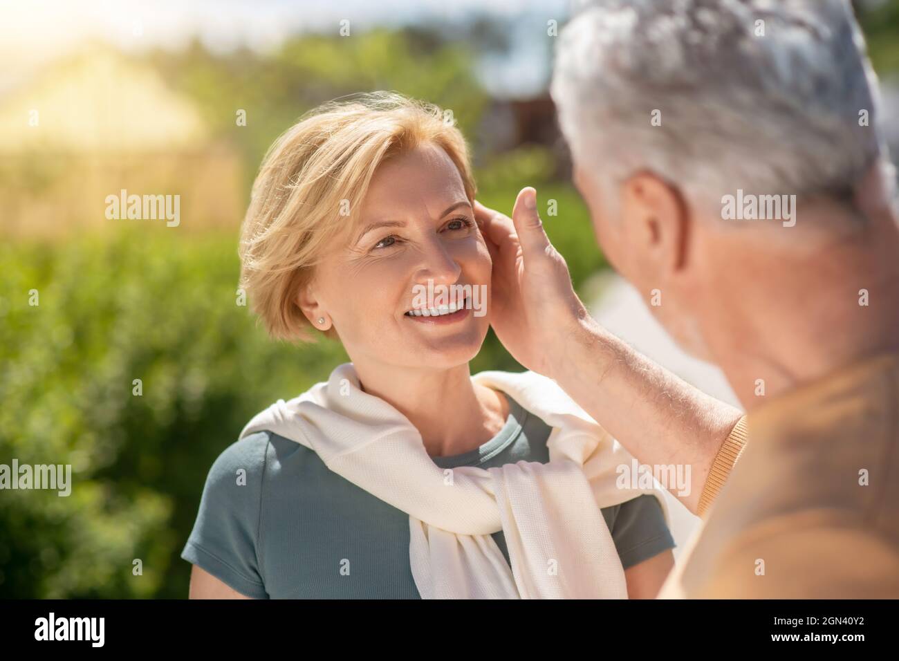 Loving husband showing affection to his wife Stock Photo