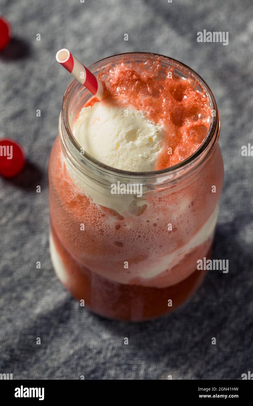Cold Cherry Cola Ice Cream Float with a Straw Stock Photo