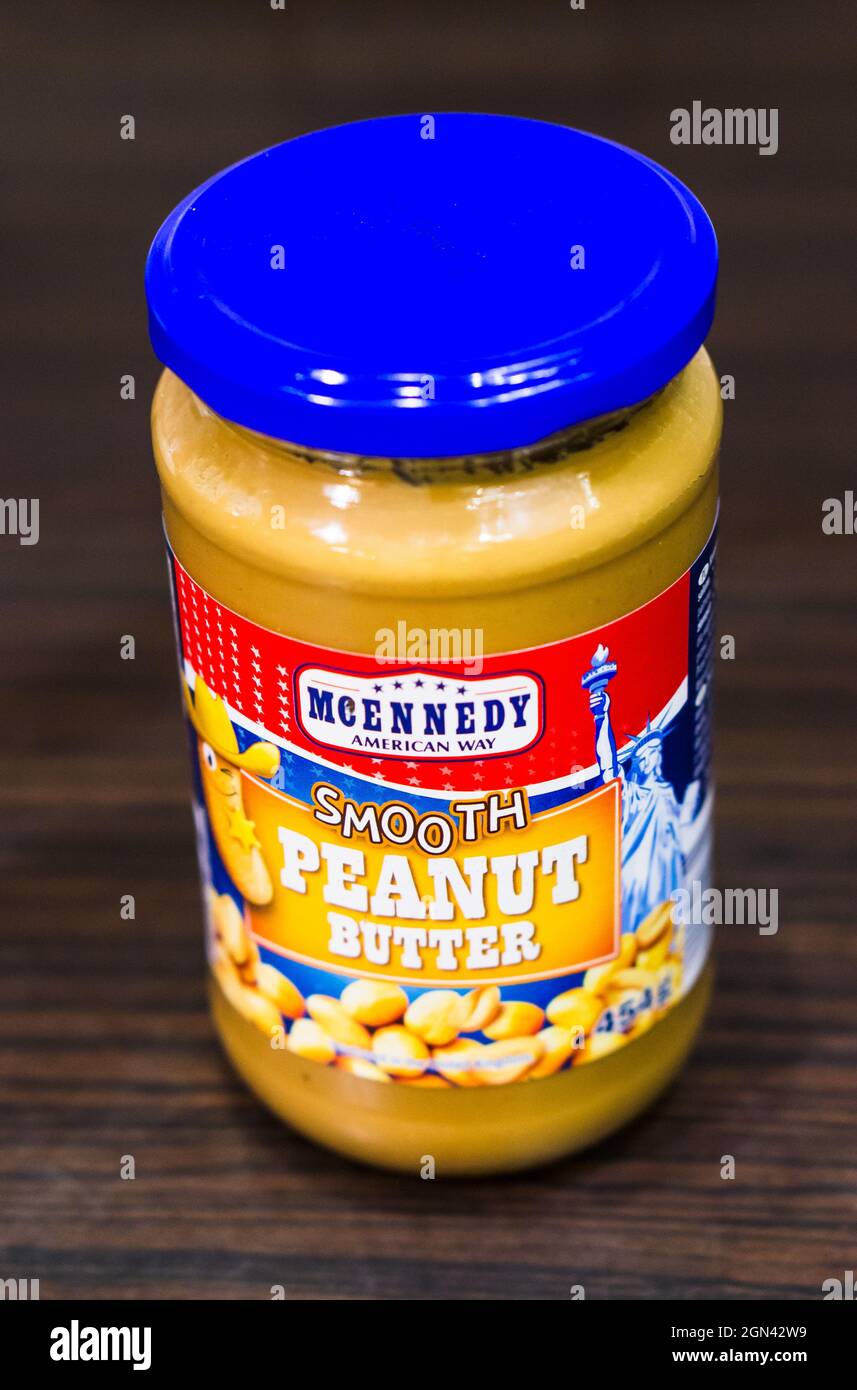 POZNAN, POLAND - Nov 20, Photo 2018: a Peanut Stock jar table A on smooth a Alamy glass in Mcennedy wooden - Butter