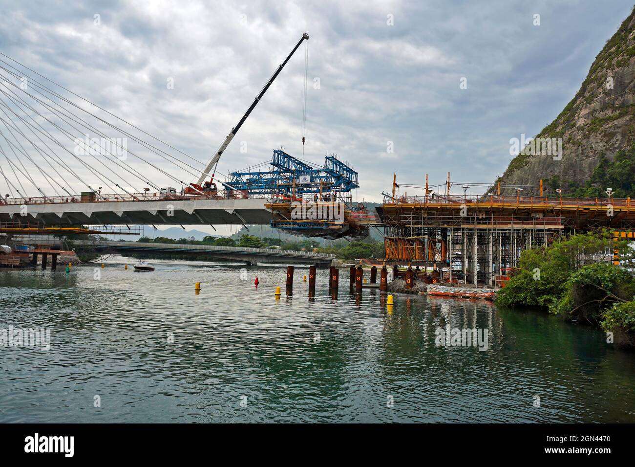 RIO DE JANEIRO, BRAZIL - NOVEMBER 14, 2015: Cable-stayed bridge construction to expand Rio's subway line to Barra da Tijuca neighborhood Stock Photo