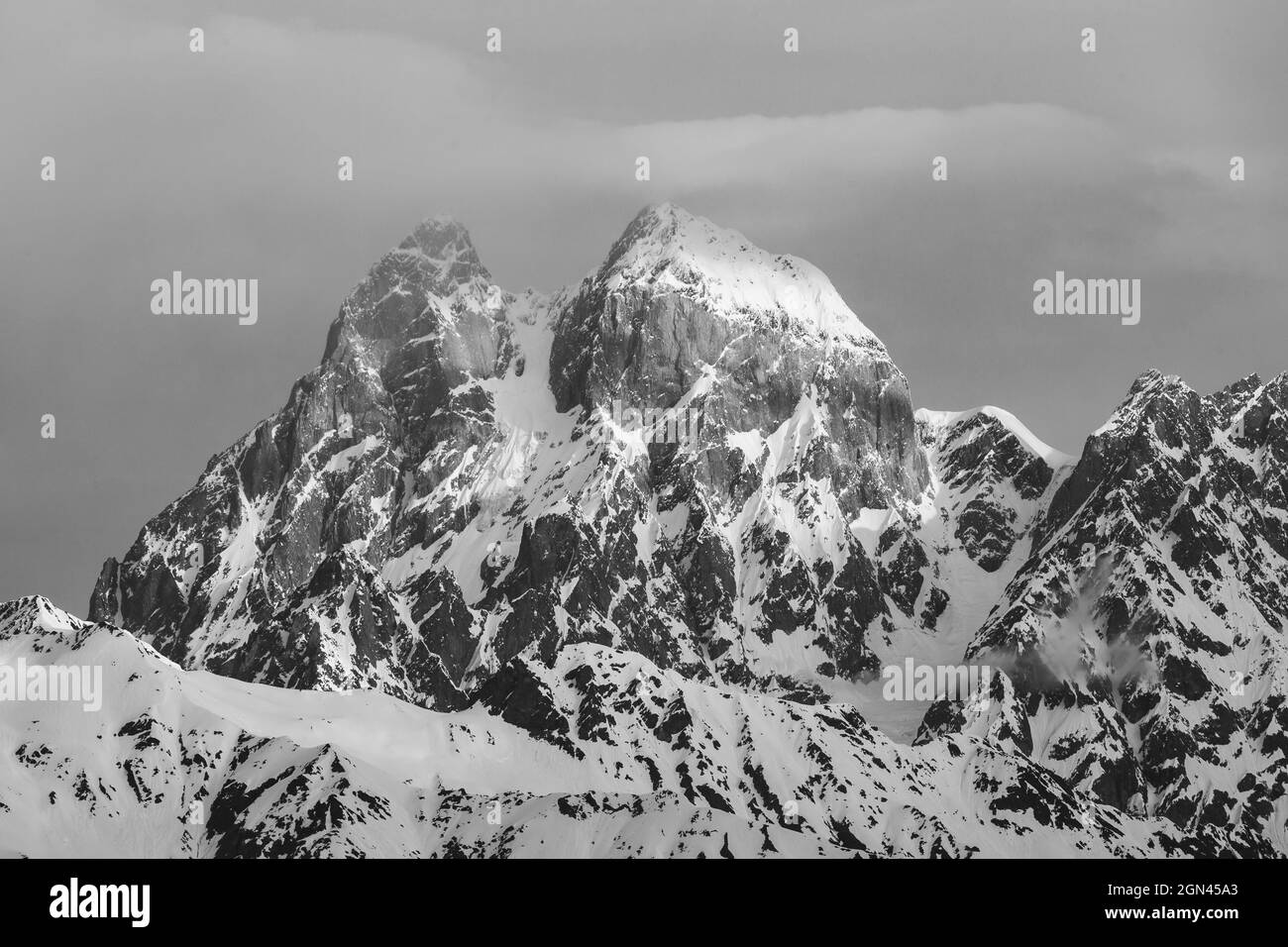 View of Mount Ushba. Ushba is one of the most notable peaks of the Caucasus range, located in the Svaneti region of Georgia. Travel. Stock Photo