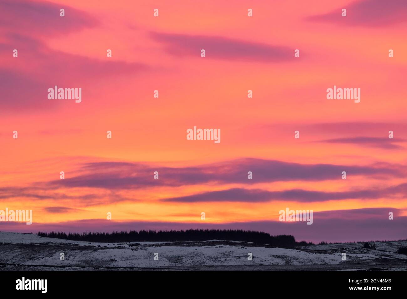 Sunset over wintry Northumberland national park, UK Stock Photo