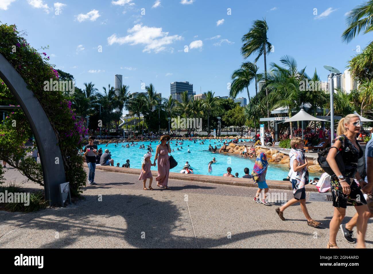 BRISBANE, AUSTRALIA - Aug 10, 2021: A breathtaking view of Brisbane downtown. People are enjoying summer and good weather on the street. Stock Photo