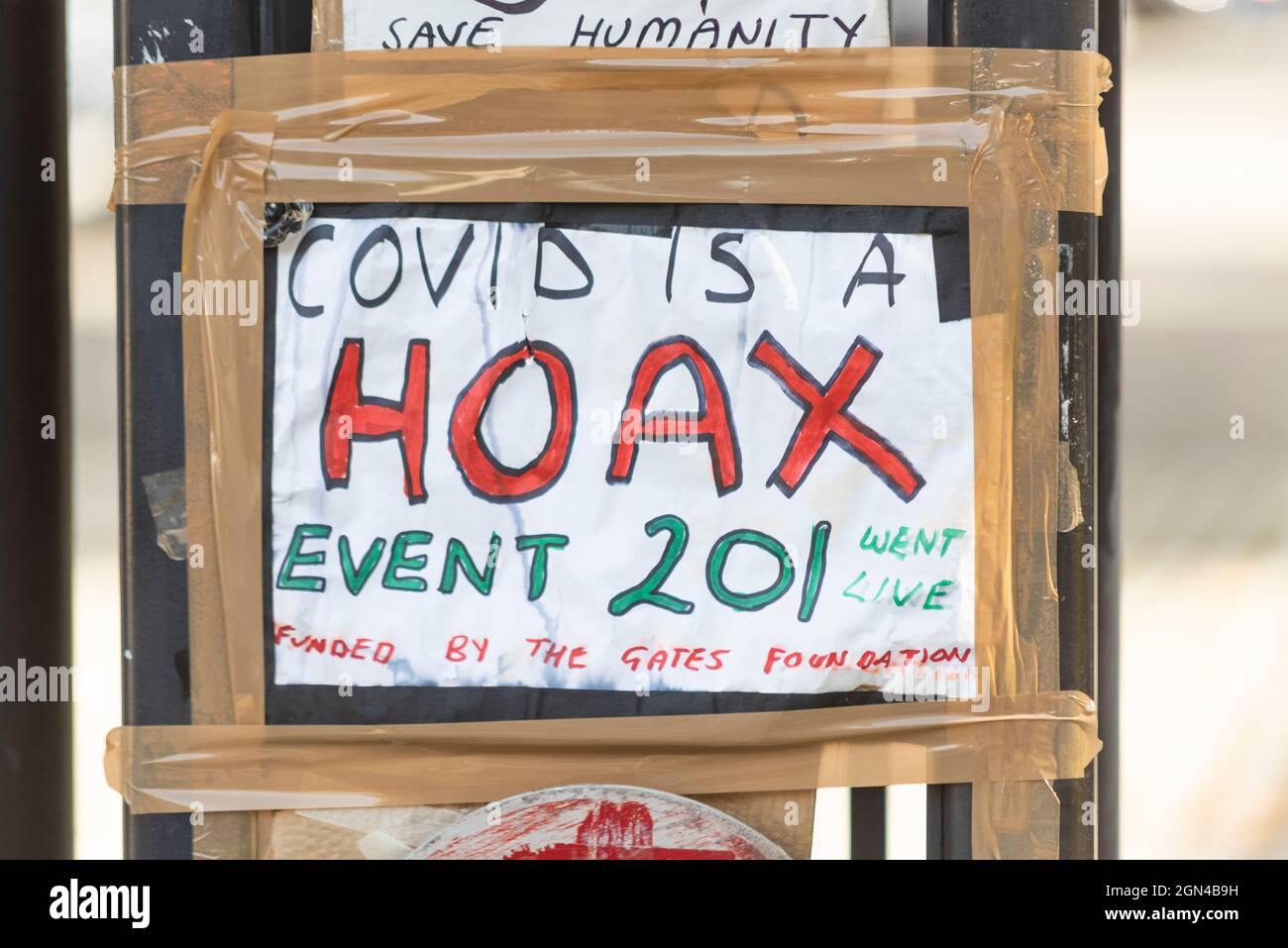 COVID hoax banner, sign, referencing the Event 201 exercise where public/private partnerships will be necessary during the response severe pandemic Stock Photo