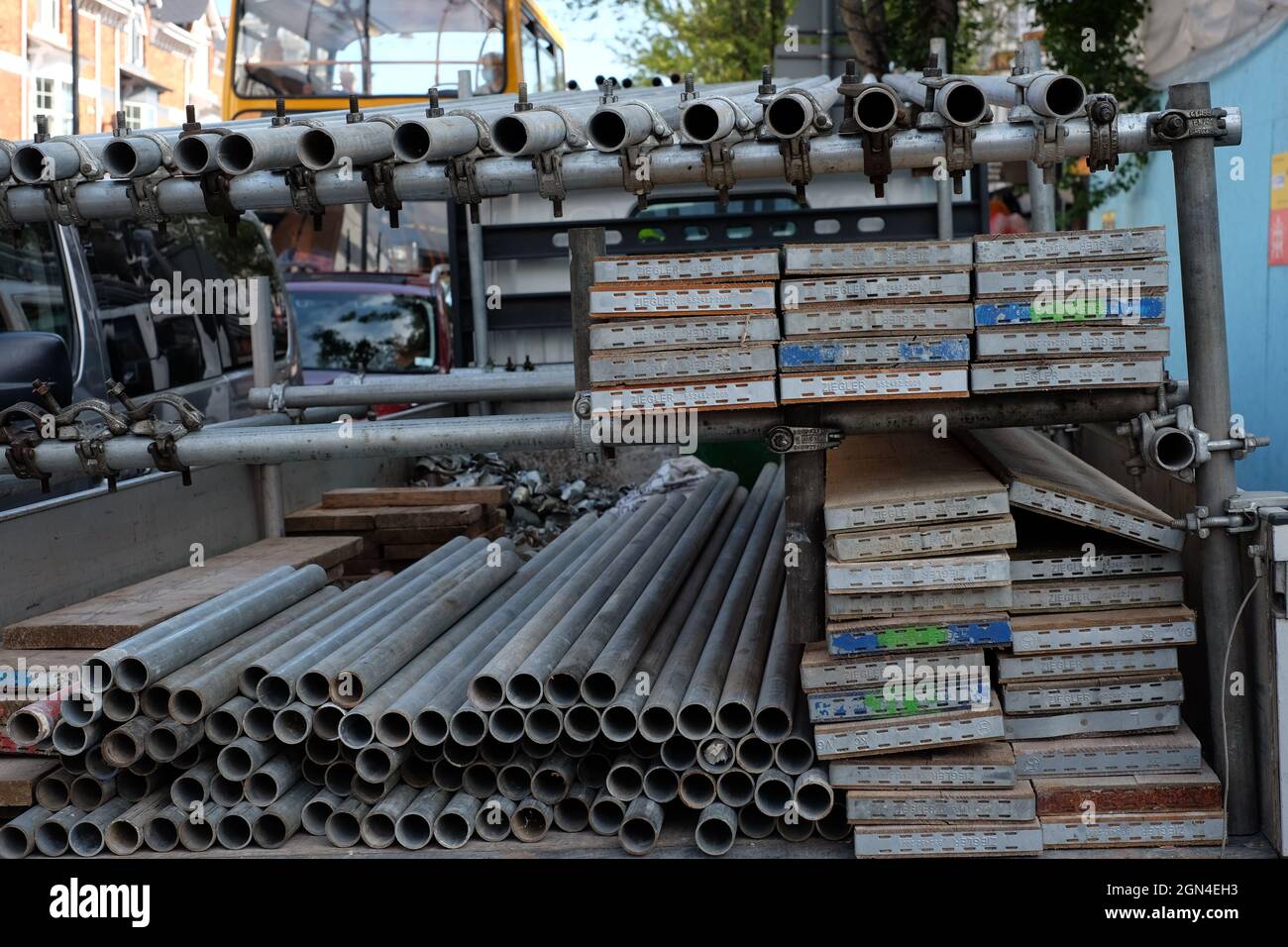 Scaffolders lorry on site loaded with scaffold boards and tubes for scaffolding job. Stock Photo