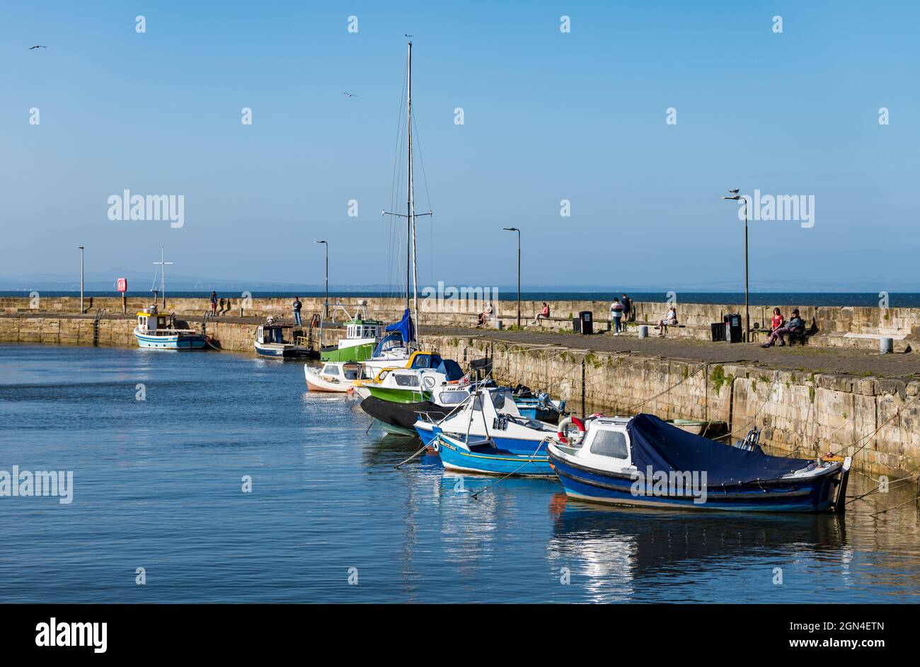 Fishing boats moored on long pier, Fisherrrow Harbour, Musselburgh