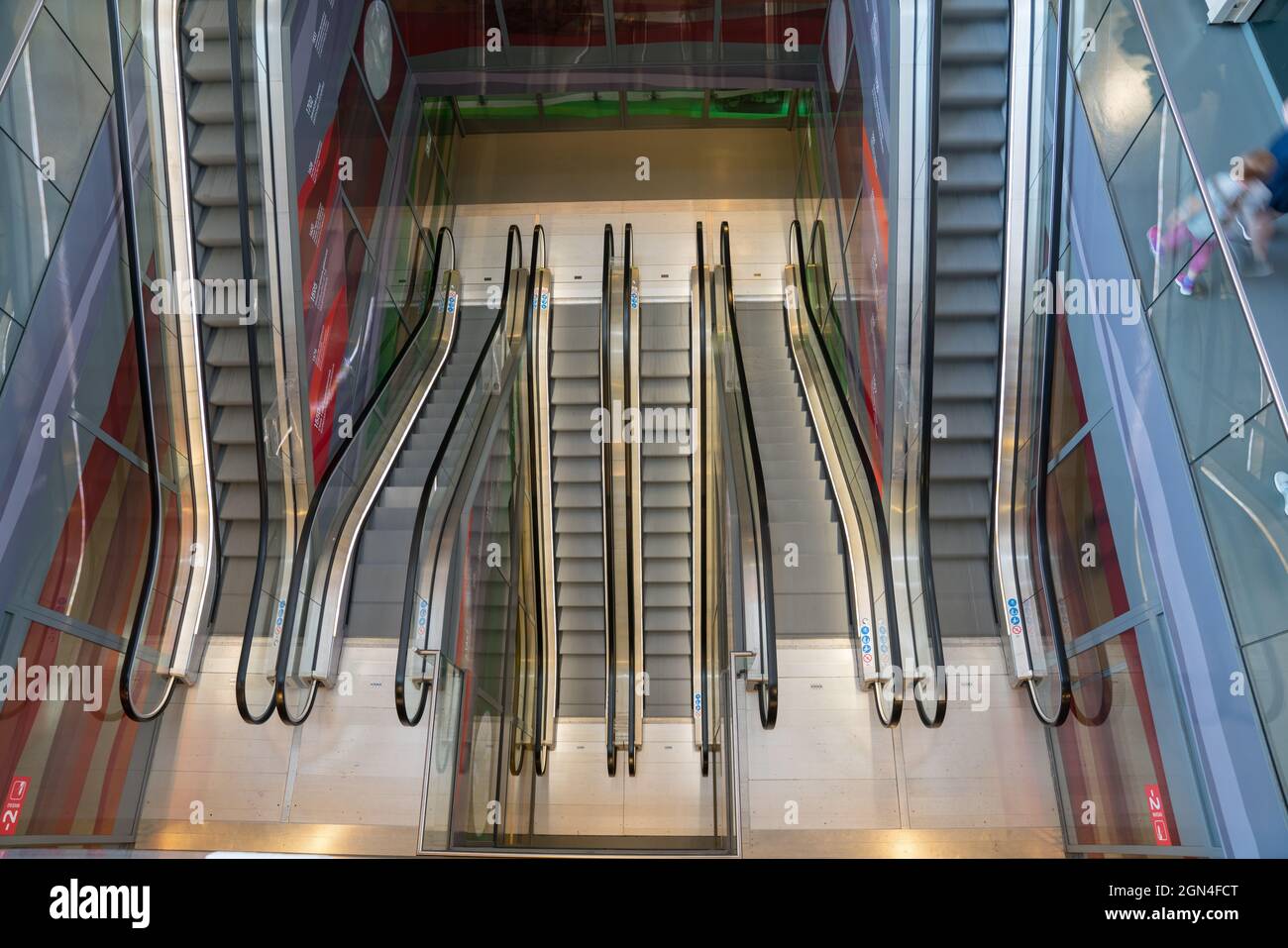 Rotterdam Netherlands- August 21 2017; Modern building interiors looking downward in escalator space. Stock Photo