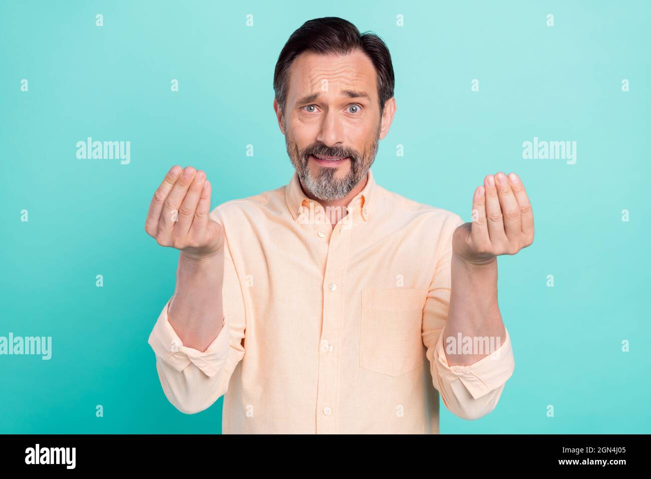 Photo of happy positive stressed mature male asking money pleading ...