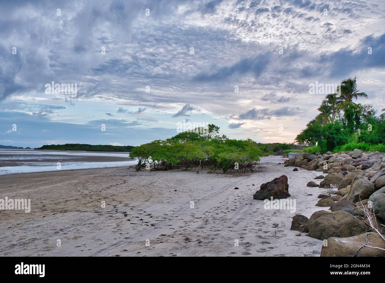 Beautiful view of a beach under the cloudy sky Stock Photo - Alamy
