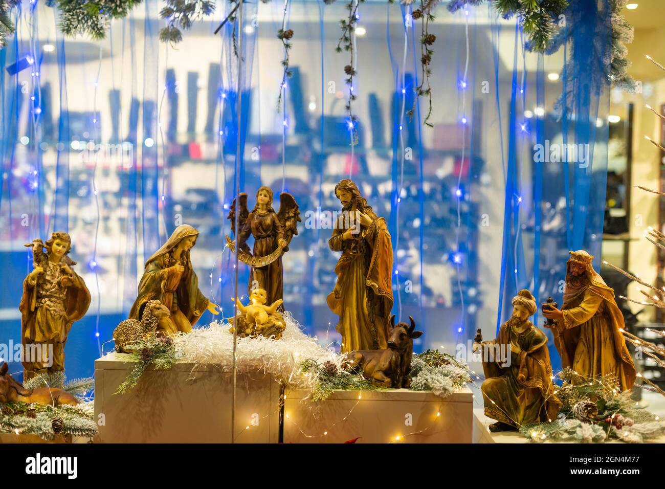 Christmas nativity scene photograph of Mary, a king, a shepherd and ...