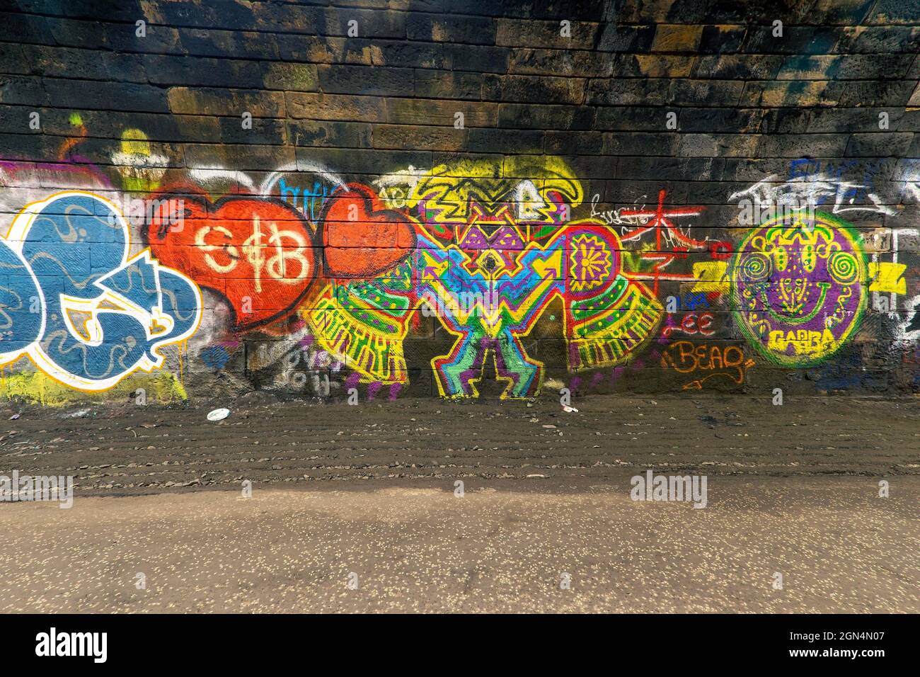 Graffiti art work in the Innocent Railway Tunnel in Edinburgh Stock
