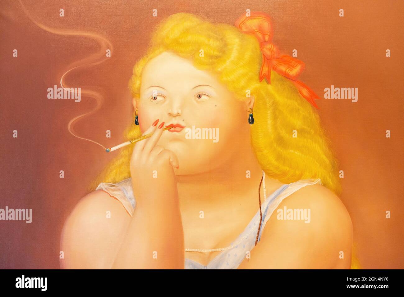 Rosita, woman with cigarette painting close up by Fernando Botero, Medellin, Colombia. Stock Photo