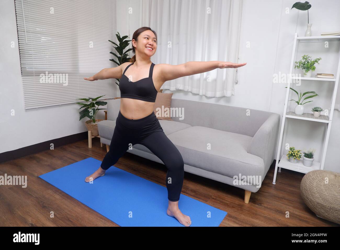 Asian girl in yoga hi-res stock photography and images - Alamy