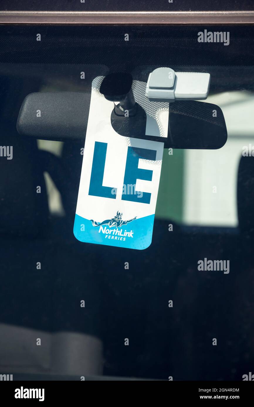 A Northlink Ferries hanger in a car window shows that it is travelling to Lerwick in the Shetland Islands. Stock Photo