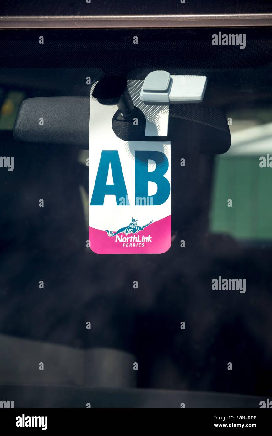 A Northlink Ferries hanger in a car window shows that it is travelling to Aberdeen. Stock Photo