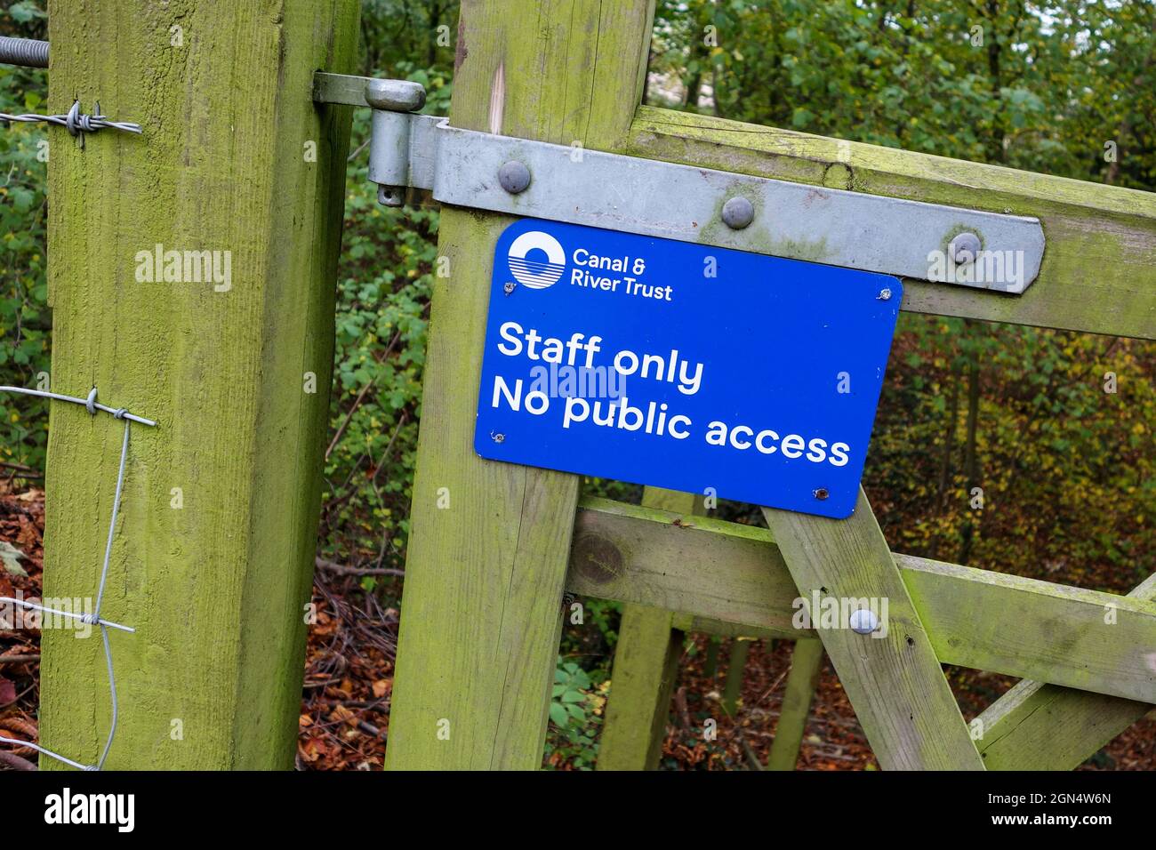 A sign erected by The Canal and River Trust saying 'Staff only No public access', England, UK Stock Photo
