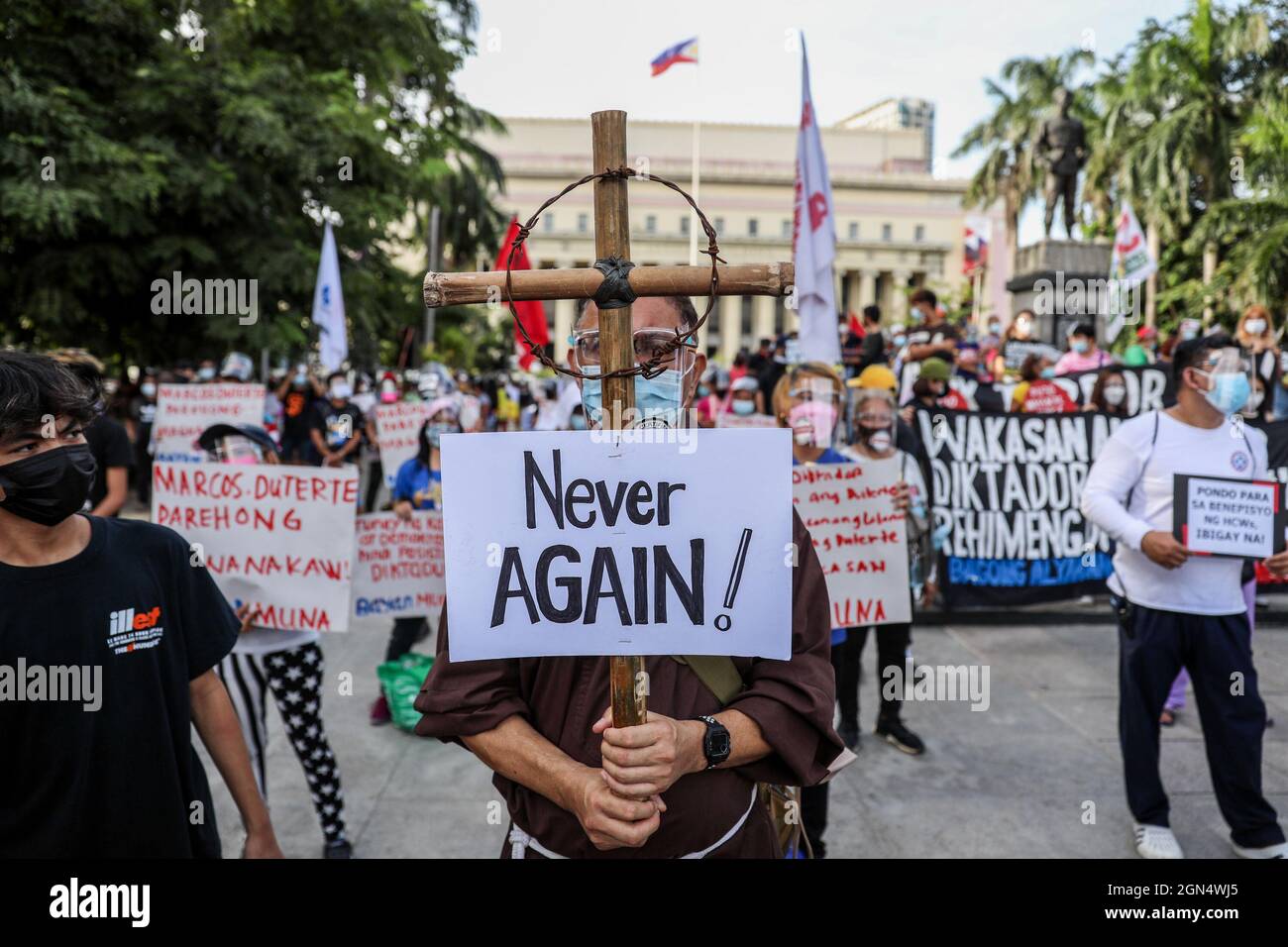 Manila, Philippines. September 21st 2021. Filipino activists hold signs during a protest march to commemorate the anniversary of the 1972 martial law. Various groups marked the 49th anniversary of the declaration of martial law by the late Philippine dictator Ferdinand Marcos with an outcry against the present government which they say has authoritarian tendencies and human rights violations. Stock Photo