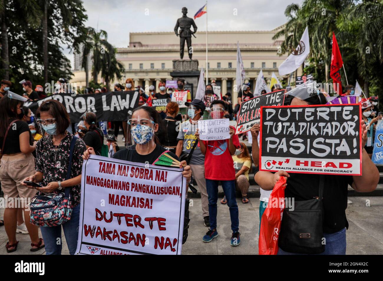 Manila, Philippines. September 21st 2021. Filipino activists hold signs ...