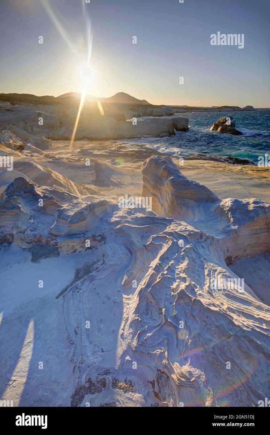 The White Cliffs Of Sarakiniko Beach At Sunset Milos Greece Stock the-white-cliffs-of-sarakiniko-beach-at-sunset-milos-greece-stock