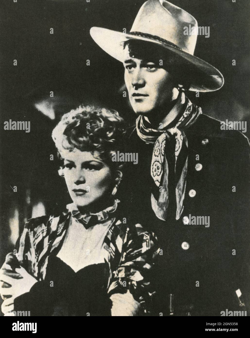 American actor John Wayne and Claire Trevor in the movie Stagecoach, USA 1939 Stock Photo