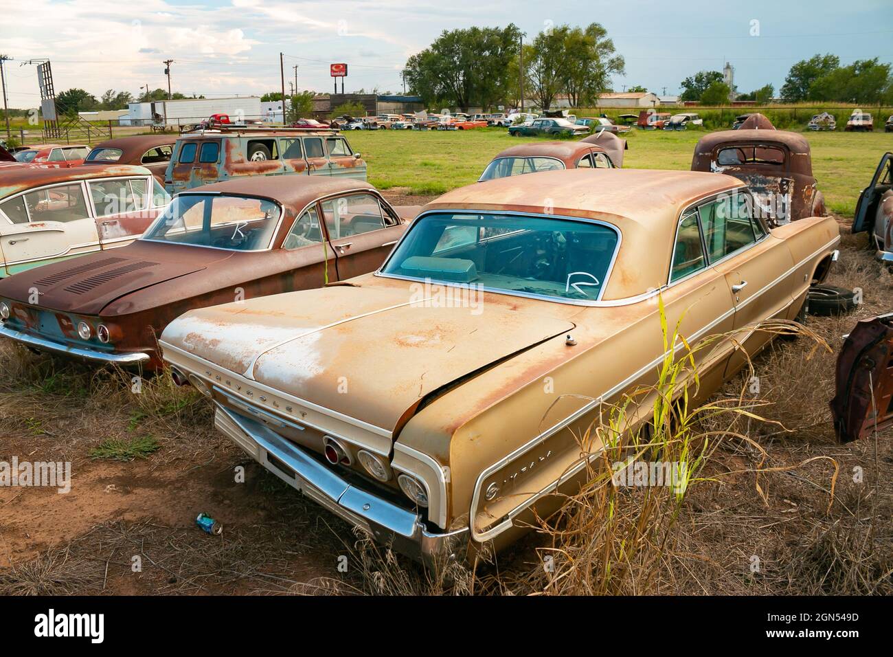 vintage wrecked American cars in junkyard near Amarillo on Route 66 USA