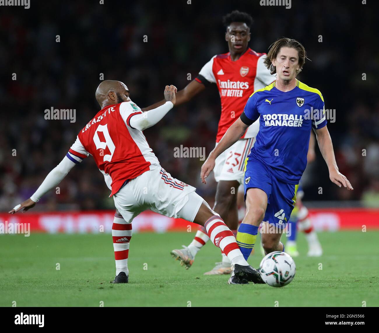 London, England, 22nd September 2021. Alexandre Lacazette of Arsenal challenges Alex Woodyard of Wimbledon  during the Carabao Cup match at the Emirates Stadium, London. Picture credit should read: David Klein / Sportimage Credit: Sportimage/Alamy Live News Stock Photo