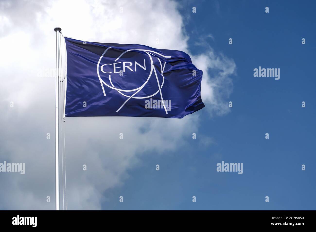 Flag of CERN. Logo, symbol of the European Organization for Nuclear Research, operating the largest particle physics laboratory in the world. Stock Photo