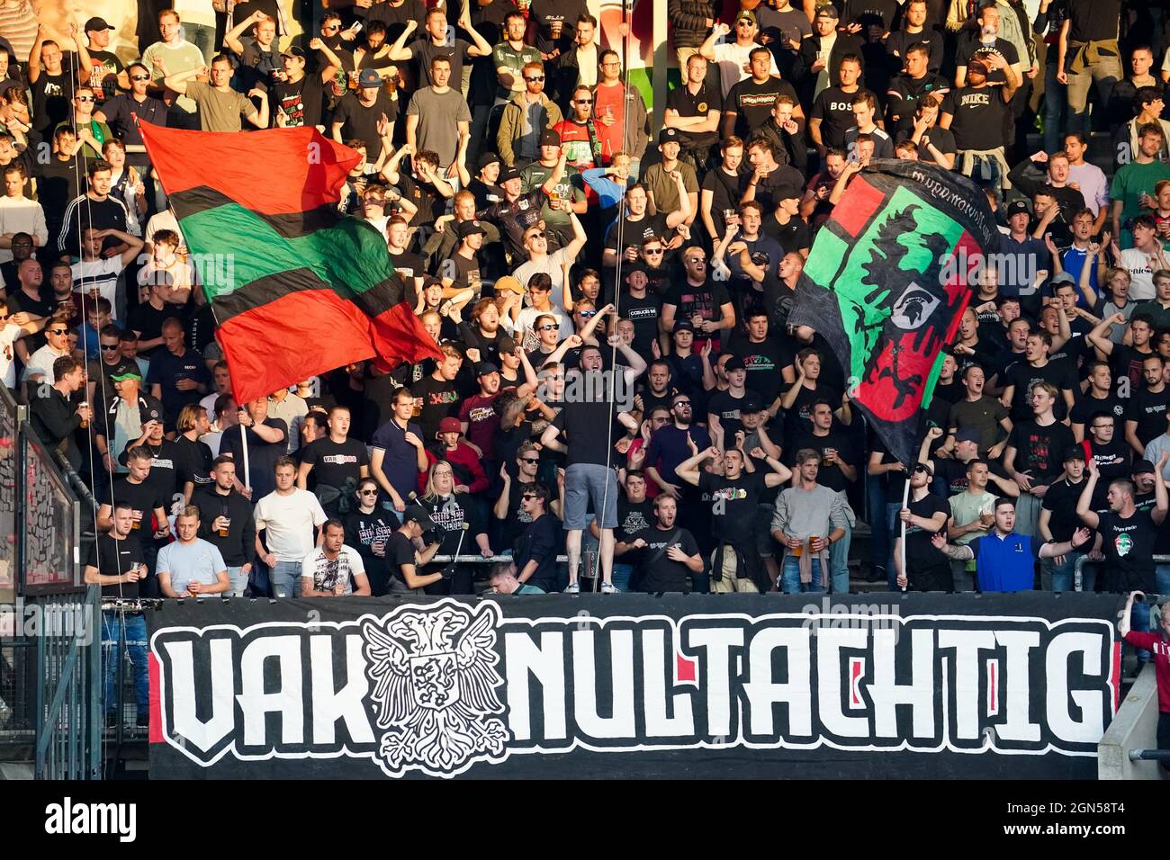 NIJMEGEN, NETHERLANDS - SEPTEMBER 22: Fans Supporters of N.E.C. Vak  Nultachtig during the Dutch Eredivisie match between N.E.C. and FC Utrecht  at the Goffertstadion on September 22, 2021 in Nijmegen, Netherlands (Photo