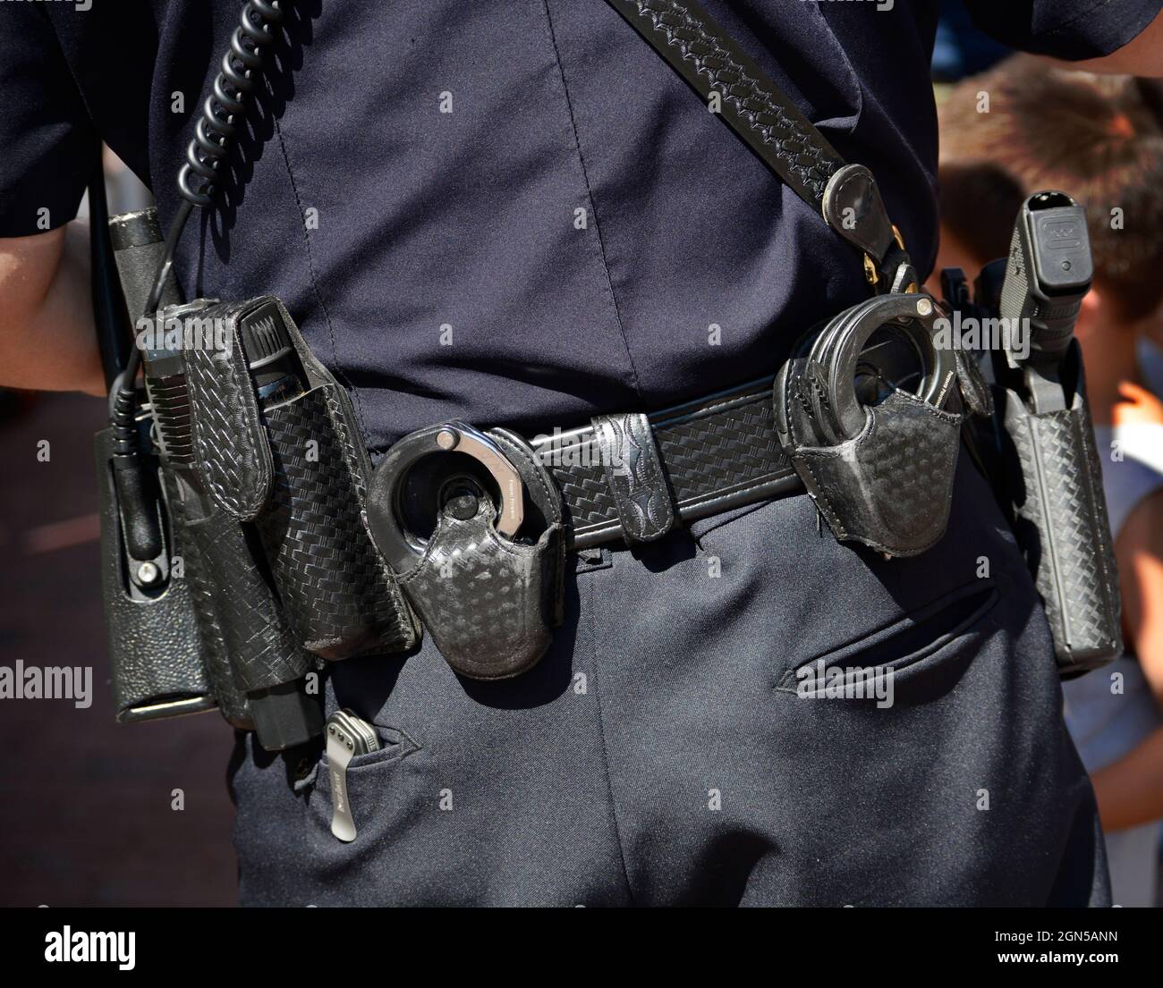 A well equipped service vest worn by a police officer in Santa Fe, New Mexico. Stock Photo