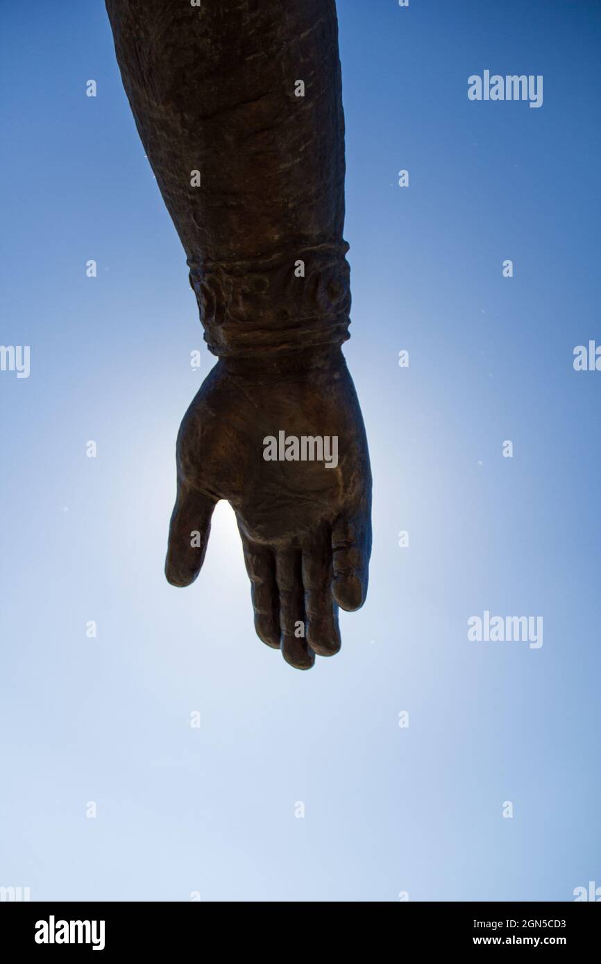 Hand of monument to Yuri Dolgorukiy, prince and founder of the city of Moscow against sky background Stock Photo