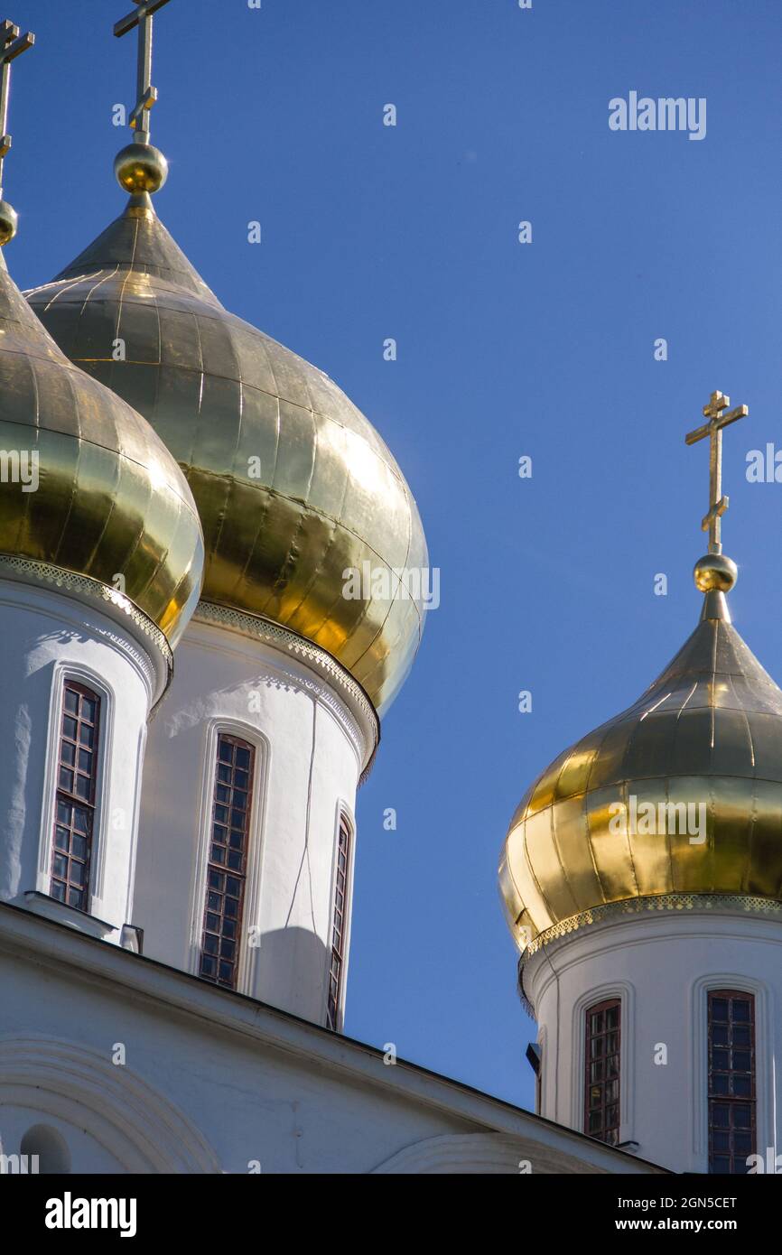 Golden domes of the Assumption Church. Dmitrov, Moscow. Stock Photo